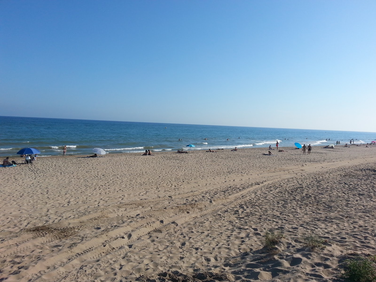 Fotografija Gava plaža z dolga ravna obala