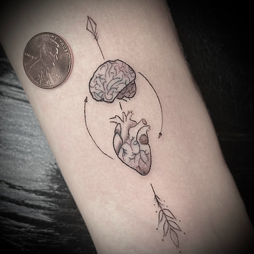 Find planet tattoo ideas for your next unique tattoo in Kissimmee at Fallen Heroes Tattoo & Piercing (Florida)