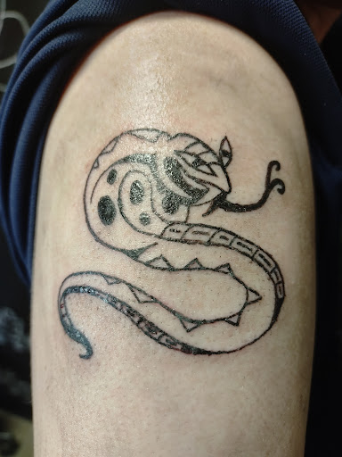 Explore guy hand tattoo ideas, creative tattoo ideas in Maineville, available at Fly Tattoo Shop