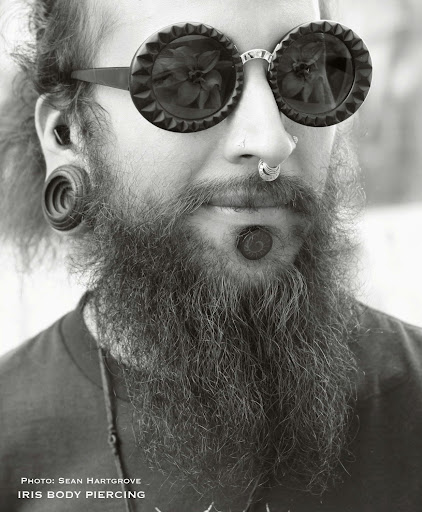 Explore skeleton hand tattoo ideas, creative tattoo ideas in Boulder, available at IRIS Piercing Studio