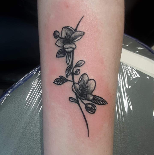 Explore rock music tattoo ideas, creative tattoo ideas in Cape Coral, available at The Tattoo Emporium