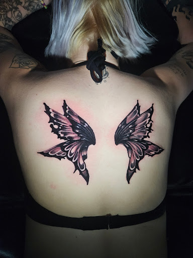 Explore small country tattoo ideas, creative tattoo ideas in Angola, available at Hoodlum Ink