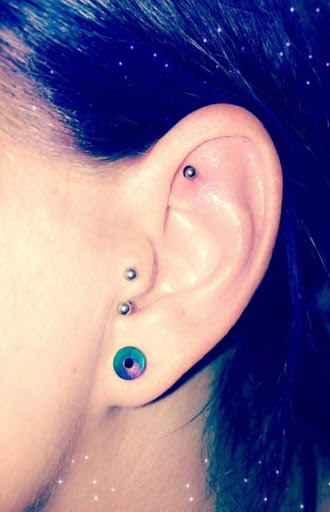 Find music tattoo ideas for men for your next unique tattoo in Benton at Spectrum Tattoo