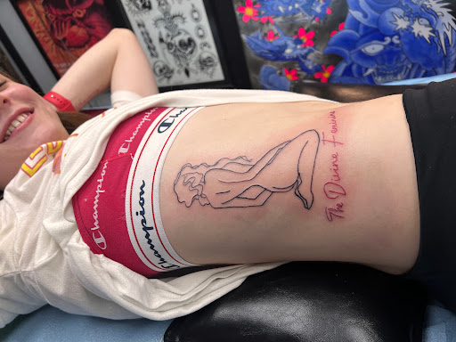 Explore tattoo on thigh ideas, creative tattoo ideas in Oklahoma City, available at Fallen Angel Tattoo & Body Piercing