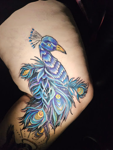 Explore kokopelli tattoo ideas, creative tattoo ideas in Angola, available at Hoodlum Ink