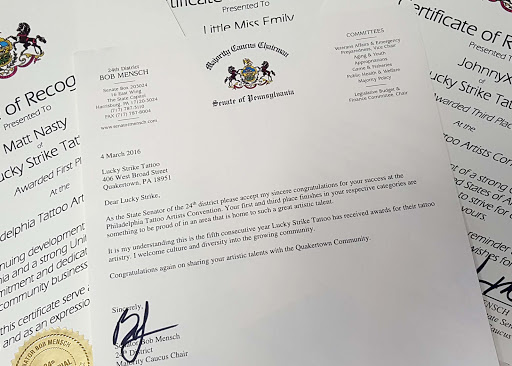 Explore tattoo ideas for top of leg, creative tattoo ideas in Quakertown, available at Lucky Strike Tattoo and Body Piercing