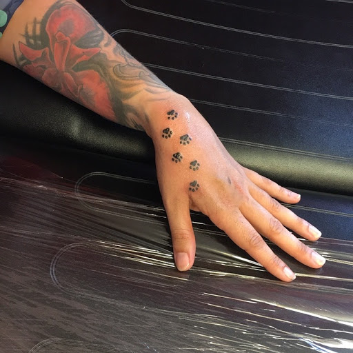 Explore small watercolor tattoo ideas, creative tattoo ideas in Forest Lake, available at Dicks Tattoo