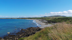 Photo de Traeth Penllech avec rivage droit, long