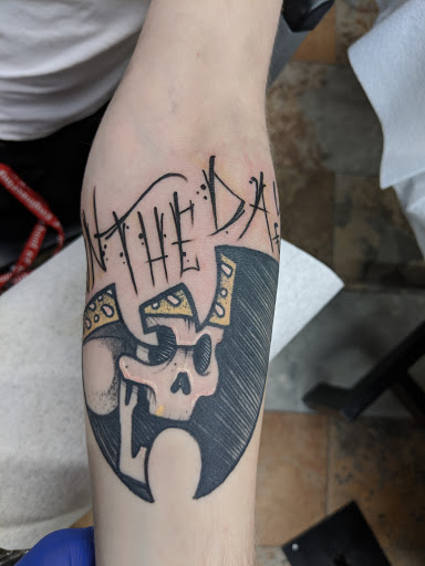 Explore alone tattoo ideas, creative tattoo ideas in Green Bay, available at The Blue Gem Tattooing