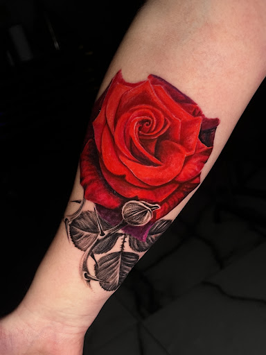 Find tattoo ideas for new moms for your next unique tattoo in Rowlett at Sinners Tattoo Studio and Supply