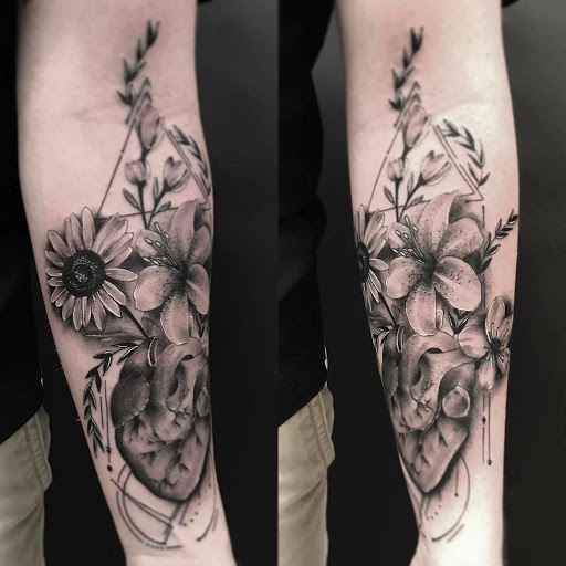 Explore dog tag tattoo ideas, creative tattoo ideas in Arlington, available at Urbans Tattoo & Piercing Studio