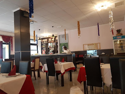 NEW BOLLYWOOD INDIAN RESTAURANT AGUILAS