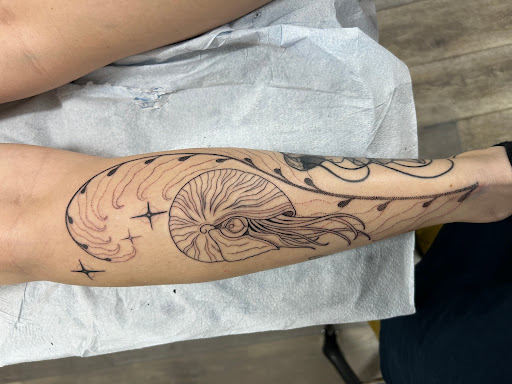 Explore butterfly cover up tattoo ideas, creative tattoo ideas in Tampa, available at Bed of Roses Tattoo Studio