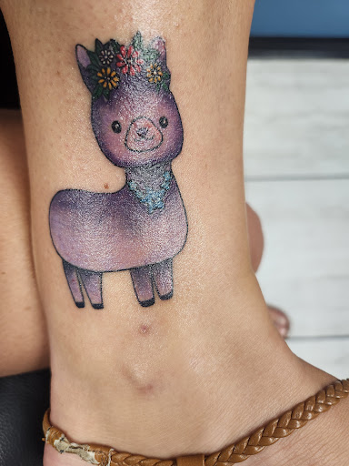 Explore butterfly wrist tattoo ideas, creative tattoo ideas in Foley, available at Symbolic Ink Tattoo Studio