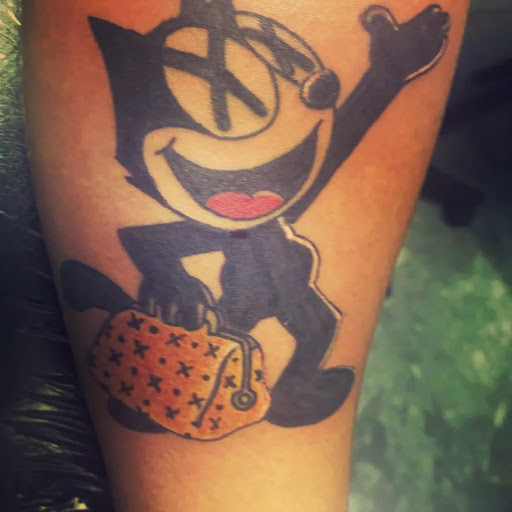Explore thigh flower tattoo ideas, creative tattoo ideas in Fort Worth, available at Voodoo Lounge Tattoo and Piercing Studio