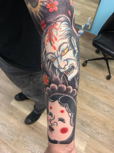 Explore men's skull tattoo ideas, creative tattoo ideas in Houghton Lake, available at Screaming Eagle Tattoo