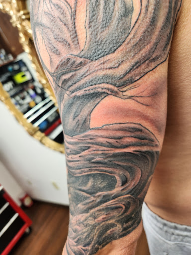 Explore pitbull tattoo ideas, creative tattoo ideas in Sioux City, available at Thorn-Side Tattoo & Piercing