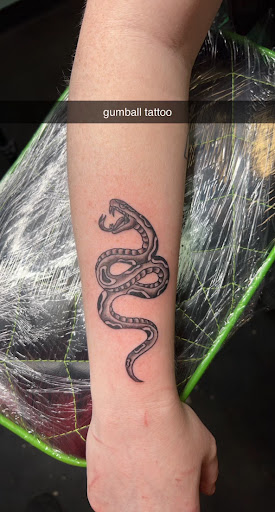 Explore tombstone tattoo ideas, creative tattoo ideas in Meridian, available at Creative Pain Tattoo Studio