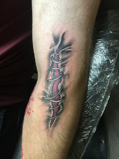 Explore rip grandpa tattoo ideas, creative tattoo ideas in Warner Robins, available at Untold Pain Tattoo Studio