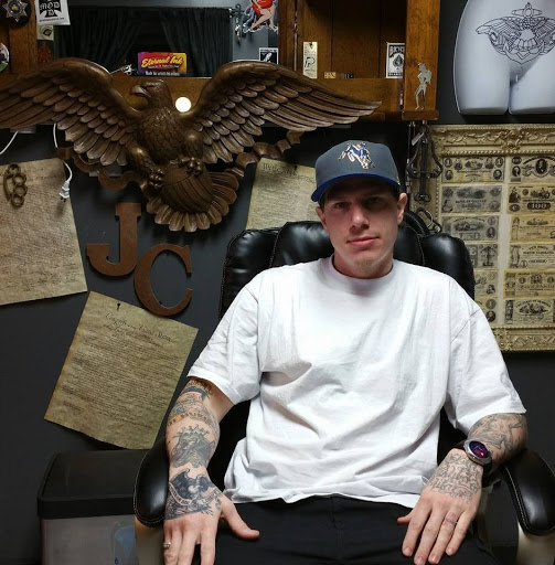 Explore men back tattoo idea, creative tattoo ideas in Foley, available at Black Sheep Custom Tattoos and Piercings