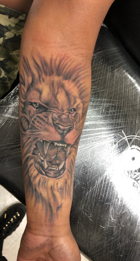 Explore half and half tattoo ideas, creative tattoo ideas in Eden, available at R1sk Takers Ink Tattoo and Piercing Lounge