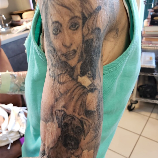 Find hand tattoo ideas for women for your next unique tattoo in Mastic at Infinity Tattoo