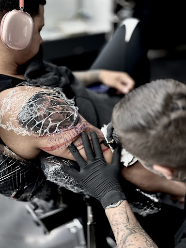 Explore chest piece tattoo ideas for men, creative tattoo ideas in Hollywood, available at Sacred Eye Tattoos