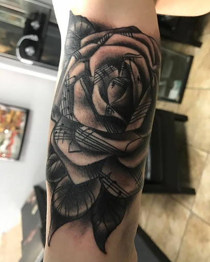 Explore women's forearm tattoo ideas, creative tattoo ideas in Colorado Springs, available at West Side Tattoo