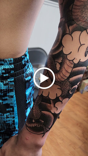 Explore pet memory tattoo ideas, creative tattoo ideas in Williamston, available at Inkd Tattoo Parlor