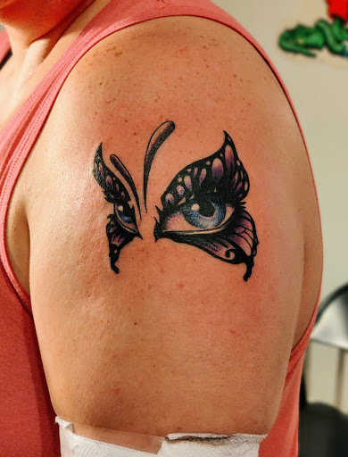 Explore rhea ripley tattoo ideas, creative tattoo ideas in Hebron, available at Explosive Ink Tattoo