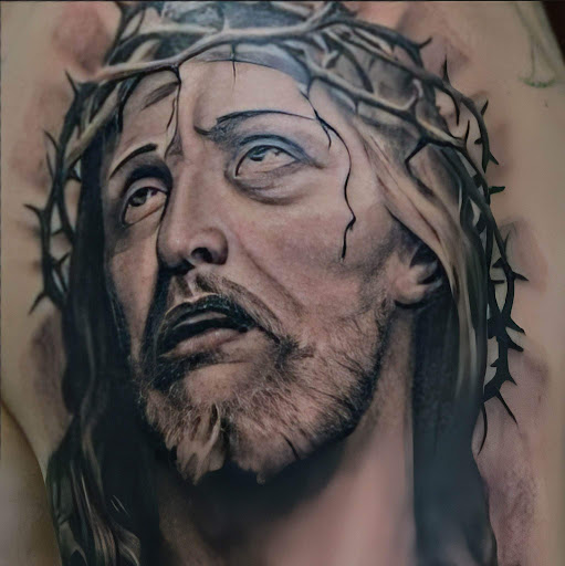 Explore mens face tattoos ideas, creative tattoo ideas in Columbia, available at Nyce Tattoos