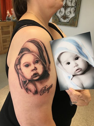 Tattoo Shop «Cherokee Creek Tattoo», reviews and photos, 32449 Ford Rd, Garden City, MI 48135, USA