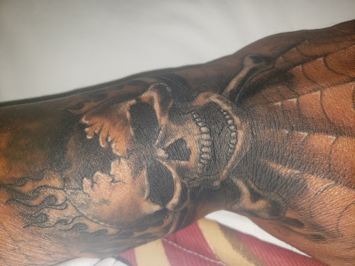 Explore hand and wrist tattoo ideas, creative tattoo ideas in Tulsa, available at Black Sheep Tattoo