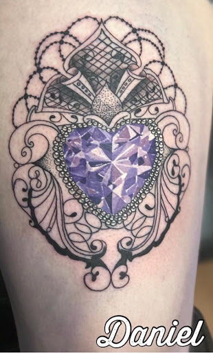 Explore ripped skin tattoo ideas, creative tattoo ideas in San Antonio, available at Twisted Tattoo
