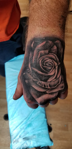 Explore neck tattoo ideas, creative tattoo ideas in Elizabethtown, available at Electric Feel Tattoos