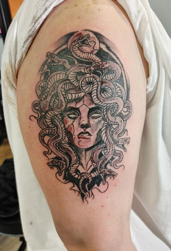 Explore shiva tattoo ideas, creative tattoo ideas in Lafayette, available at DragonsBane Tattoo & Body Piercing