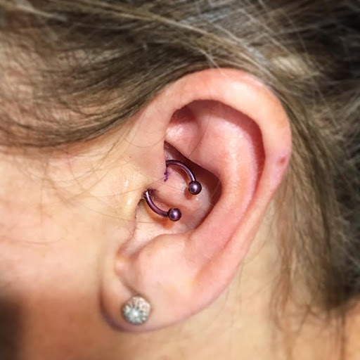 Explore rob zombie tattoo ideas, creative tattoo ideas in Louisburg, available at Purple Dot Piercings