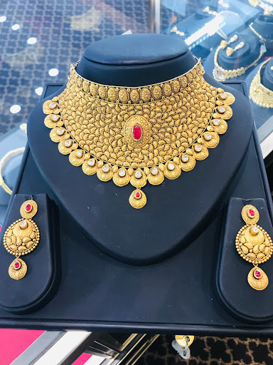 Jewelry Store «Malani Jewelers, Dallas (TX) - 22Kt Gold & Diamond Jewelry», reviews and photos, 300 S Central Expy, Richardson, TX 75080, USA