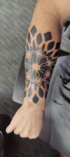 Explore dog paw print tattoo ideas, creative tattoo ideas in Tampa, available at Las Vegas Tattoo Co
