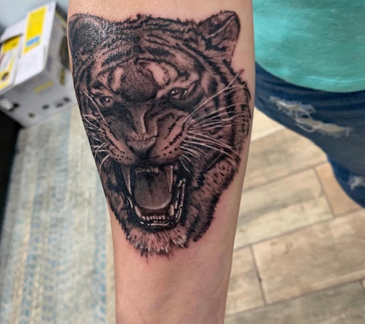 Explore the shining tattoo ideas, creative tattoo ideas in Buford, available at Wild Tribe Tattoos and Piercings