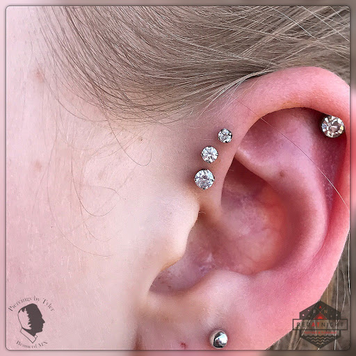 Explore hockey tattoo ideas, creative tattoo ideas in Brainerd, available at Red at Night Tattoos and Piercings