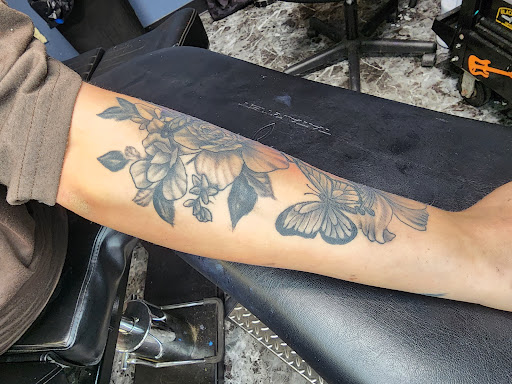 Explore front of neck tattoo ideas, creative tattoo ideas in Yankton, available at Exquisite Ink