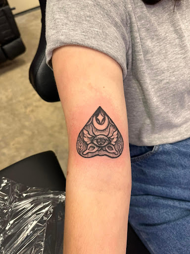 Explore women's hip tattoo ideas, creative tattoo ideas in Danville, available at The Pokers Club Tattoo Studio