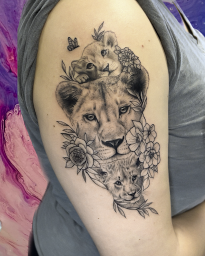 Explore purple flower tattoo ideas, creative tattoo ideas in Dublin, available at Ethereal ink - Body & Cosmetic Tattoos