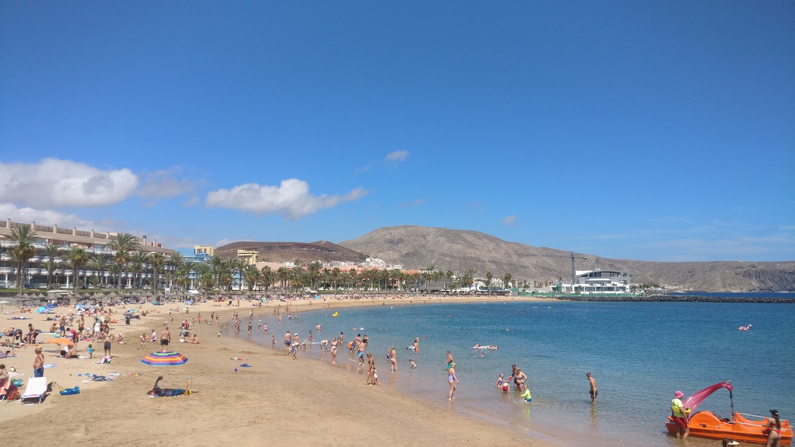 Photo de Plage de Las Americas avec sable lumineux de surface