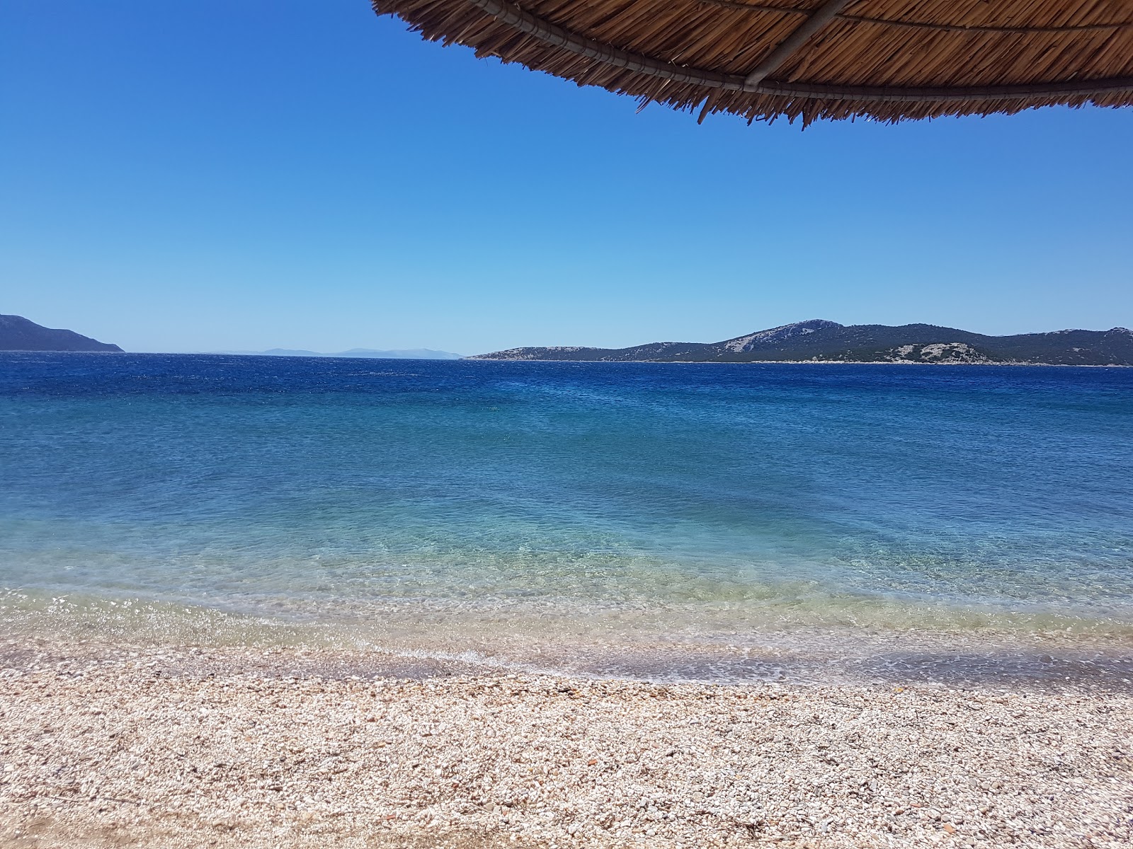 Foto van Aria beach met hoog niveau van netheid