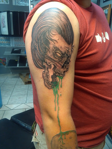 Explore forearm lion tattoo ideas, creative tattoo ideas in Bradenton, available at Memory Lane Tattoo Co.