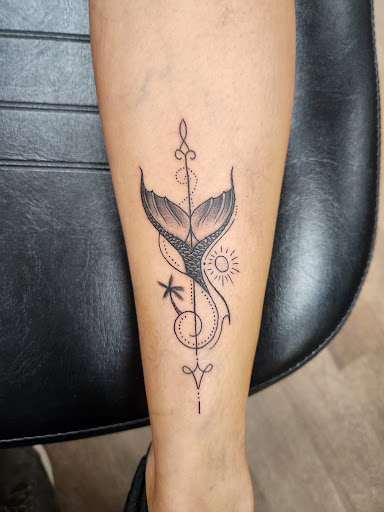 Explore green arrow tattoo ideas, creative tattoo ideas in Roanoke, available at Black Caesar Tattoos & Piercings