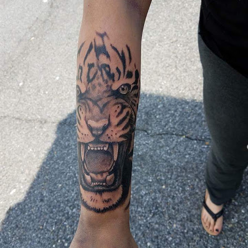 Find addams family tattoo ideas for your next unique tattoo in Millsboro at Tattoo Galaxy (Millsboro) Piercing & Custom tattoos