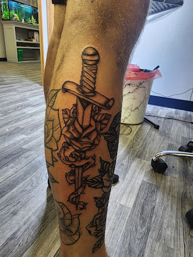 Explore ripped tattoo ideas, creative tattoo ideas in Sioux City, available at Tattoo Monkey